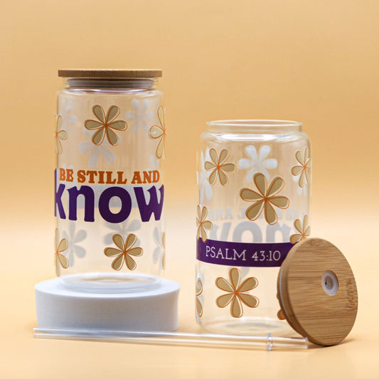 Clear glass cup with the phrase ‘Be Still and Know’ inspired by Psalm 46:10, offering a calming reminder to trust in God’s presence and peace.