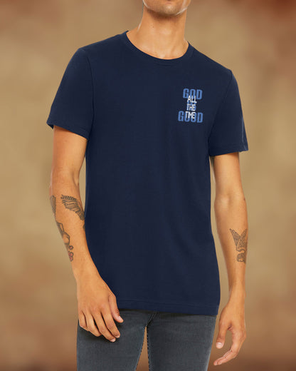 Front view of navy Christian t-shirt with the message “God is Good All the Time” in distressed blue text.