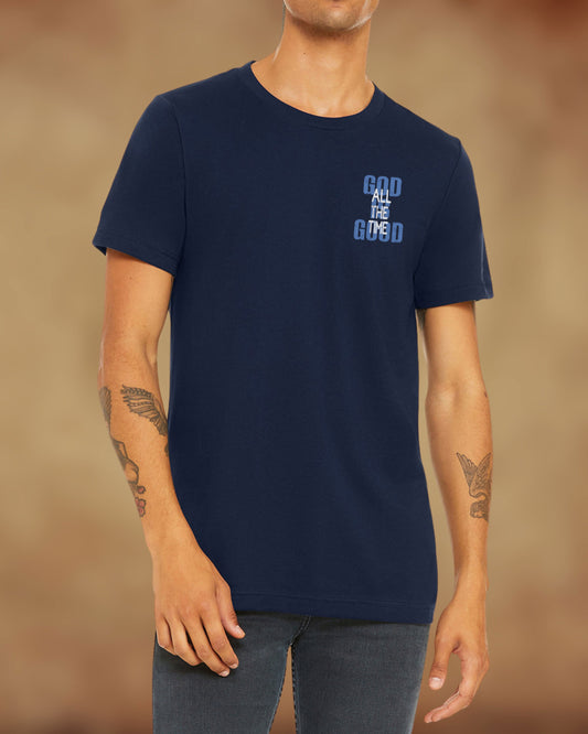Front view of navy Christian t-shirt with the message “God is Good All the Time” in distressed blue text.