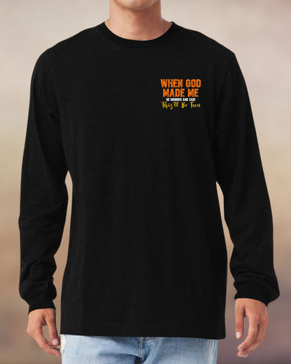 Christian long sleeve black tee with a fun message: “When God made me, He grinned and said this’ll be fun.
