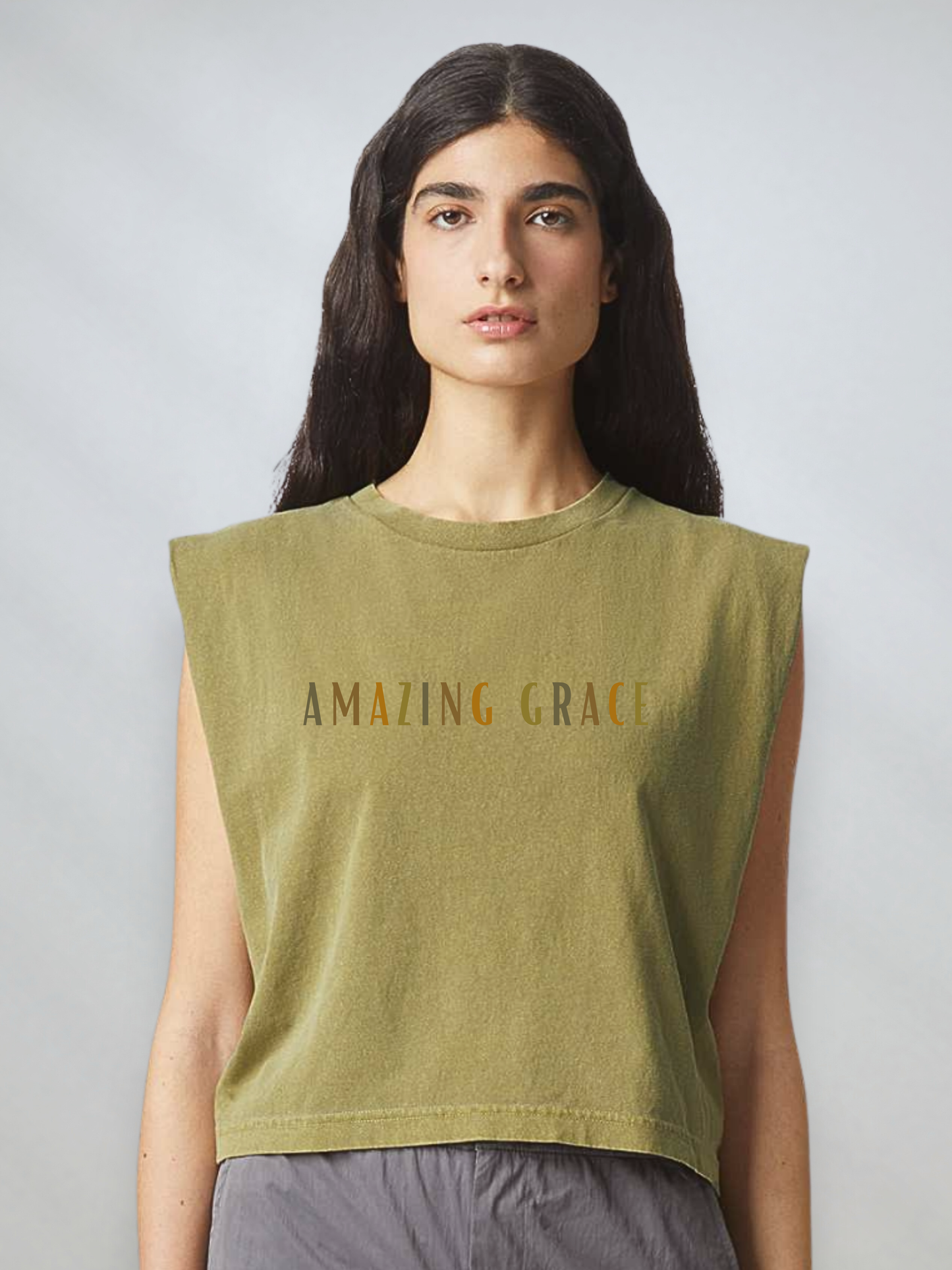 Women’s faded army heavyweight muscle tee featuring the phrase “Amazing Grace” in a minimalist design on the front.