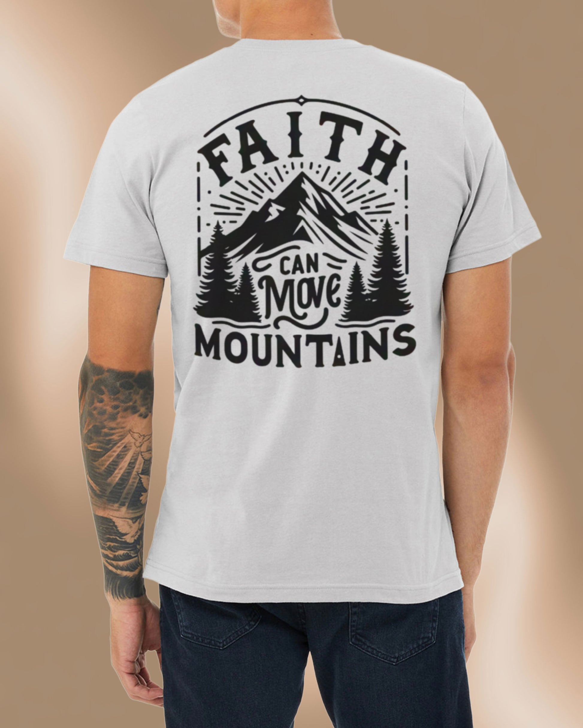 Athletic grey t-shirt featuring a bold mountain design and the phrase “Faith Can Move Mountains.”