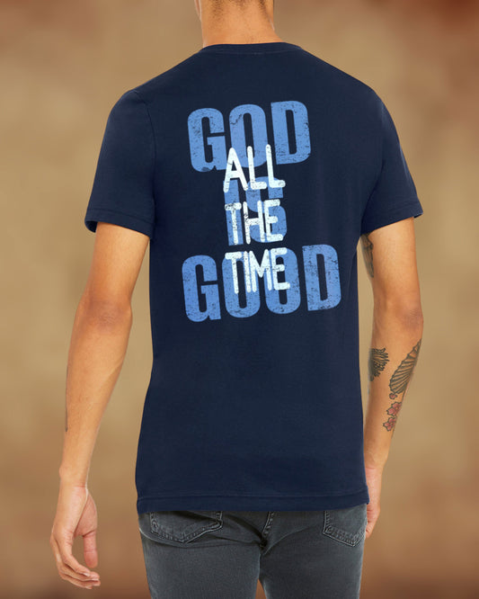 Back view of navy Christian t-shirt with the message “God is Good All the Time” in distressed blue text.