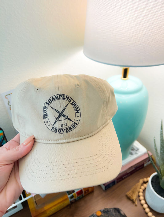 Tan cotton cap with DTF printed Iron Sharpens Iron Proverbs 27:17 design