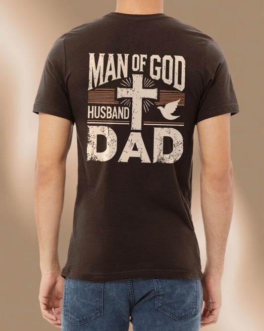 Brown Christian men’s t-shirt with bold “Man of God, Husband, Dad” design printed on the back with a cross and dove.