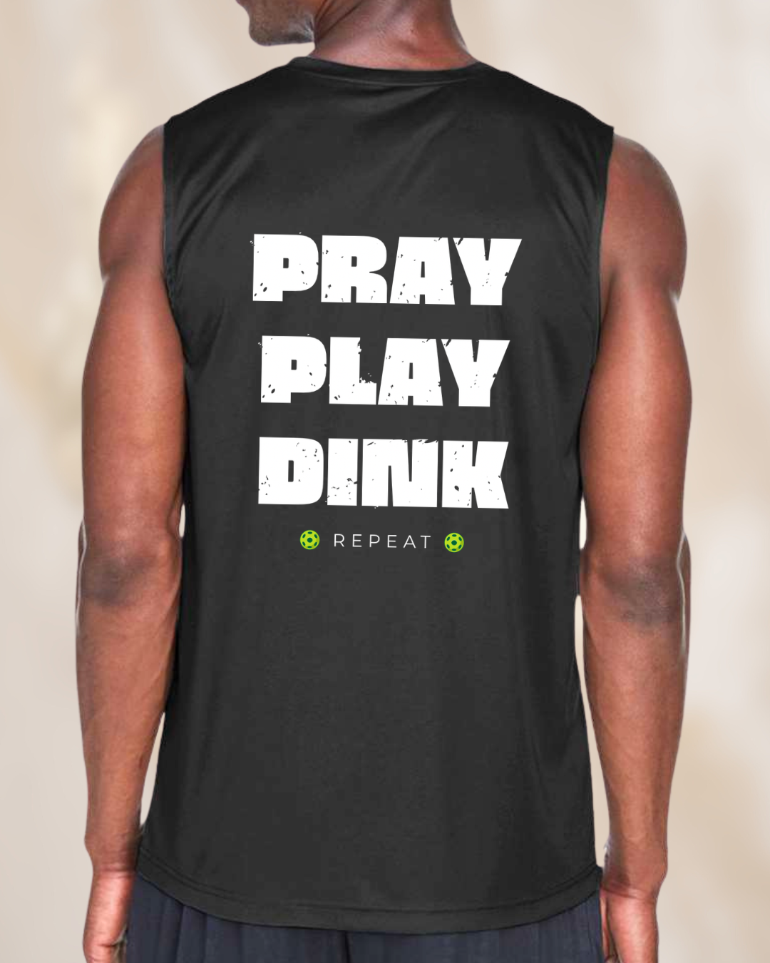Back view of a men’s black sleeveless pickleball performance shirt featuring the bold phrase “Pray Play Dink Repeat” with pickleball graphics.
