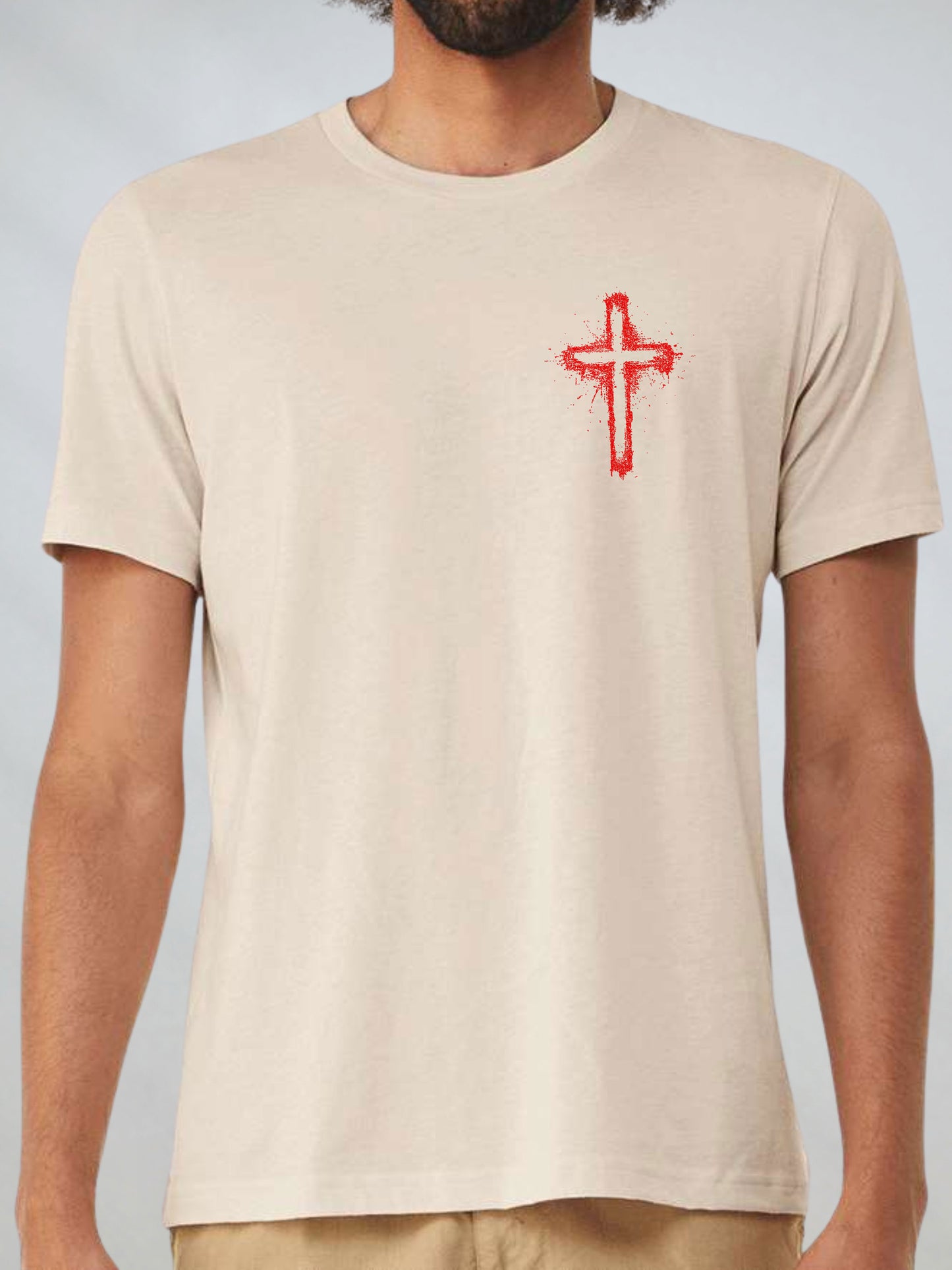 Front view of the Saved by the Blood Christian T-Shirt in Dust color showing red cross design
