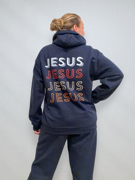 Back view of navy hoodie with large stacked JESUS print, part of matching loungewear set.
