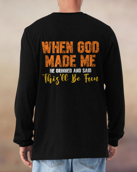 Christian long sleeve black tee with a fun message: “When God made me, He grinned and said this’ll be fun.